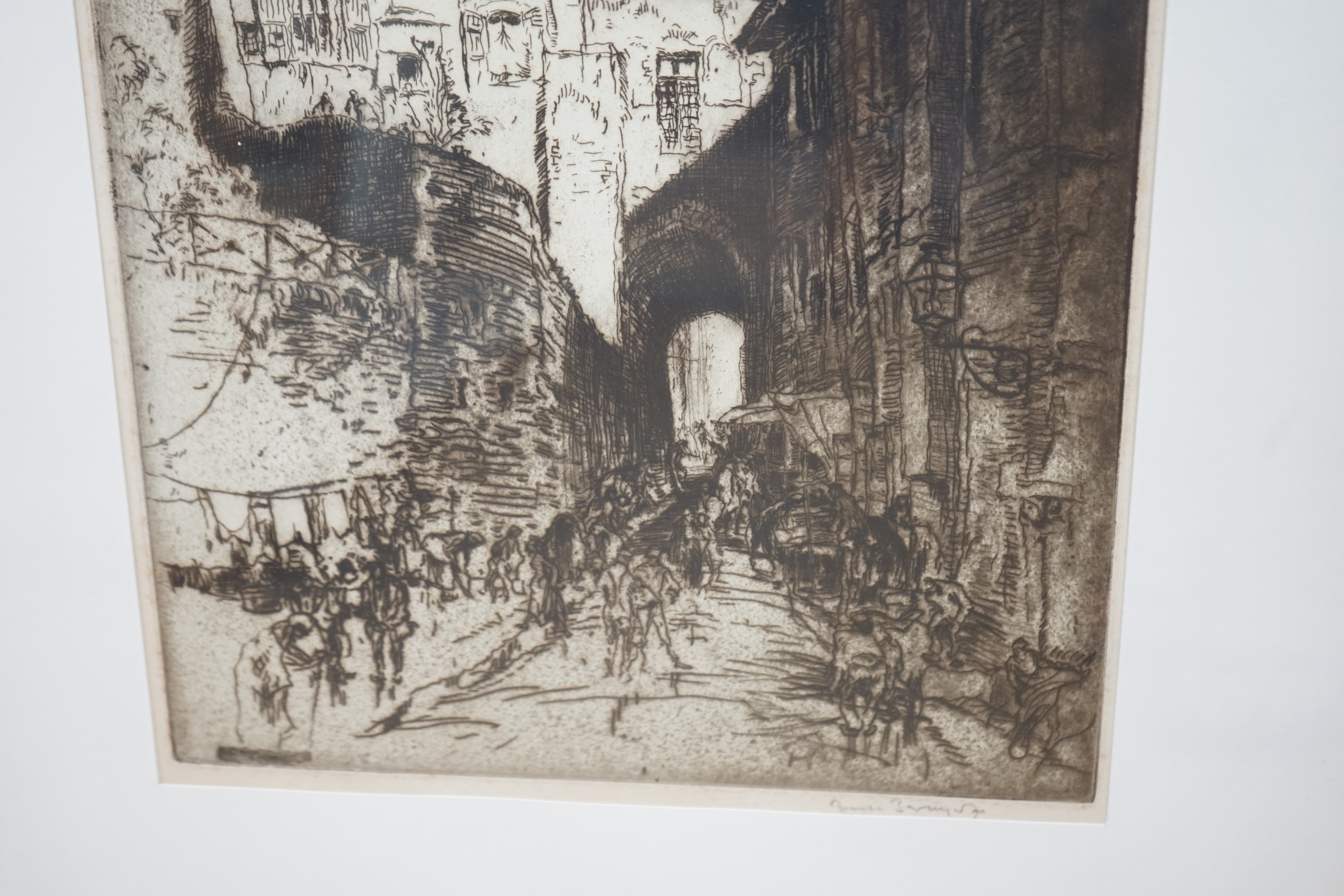 Frank Brangwyn (Welsh, 1867-1956), lithograph and etching, Street scenes with buildings, each signed in pencil, largest 42 x 31cm. Condition - poor to fair, discolouration and rippling to the paper